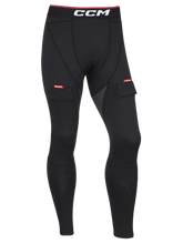 Load image into Gallery viewer, CCM Men&#39;s Compression Jock Pant With Gel Grips. Black pants with white CCM logo and jock.

